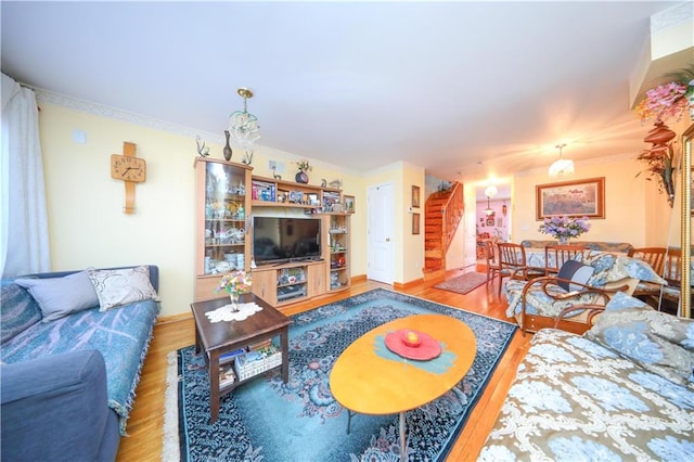 78 Townsend Ave, Staten Island, NY 10304 - living room with stairway, wood finished floors, and crown molding