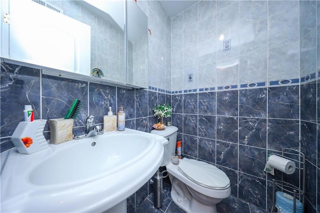 78 Townsend Ave, Staten Island, NY 10304 - bathroom with toilet, a sink, and tile walls