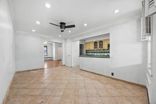 1572 E 34th St, Brooklyn, NY 11234 - unfurnished room with ceiling fan, ornamental molding, recessed lighting, a baseboard radiator, and baseboards