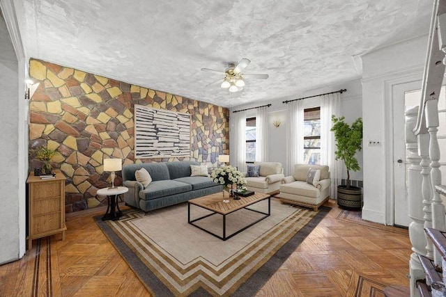 1572 E 34th St, Brooklyn, NY 11234 - living area featuring ceiling fan and a textured ceiling