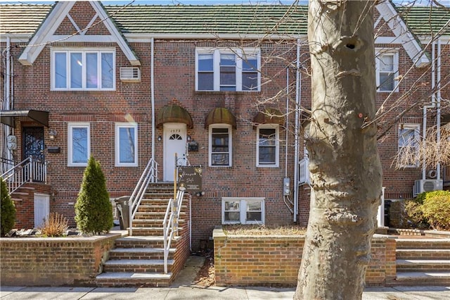 1572 E 34th St, Brooklyn, NY 11234 - view of front of home featuring a tiled roof and brick siding