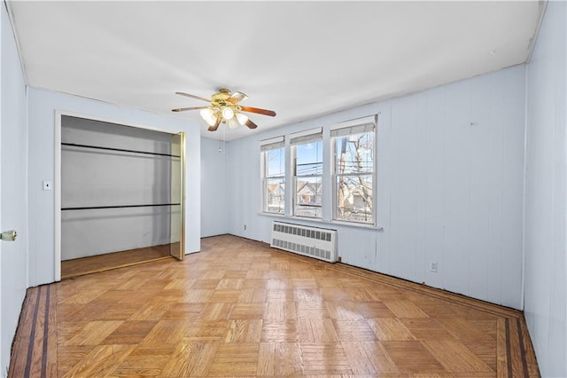 1572 E 34th St, Brooklyn, NY 11234 - unfurnished bedroom featuring radiator and a ceiling fan