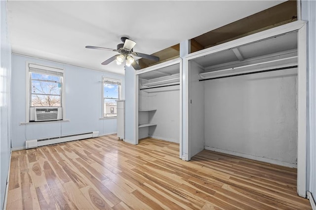 1572 E 34th St, Brooklyn, NY 11234 - unfurnished bedroom featuring a baseboard radiator, multiple closets, wood finished floors, cooling unit, and ceiling fan