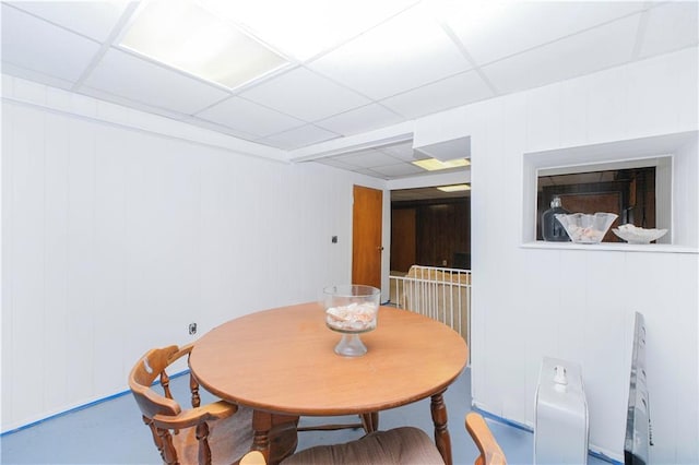 dining room featuring a paneled ceiling