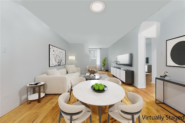 dining room featuring light wood-type flooring