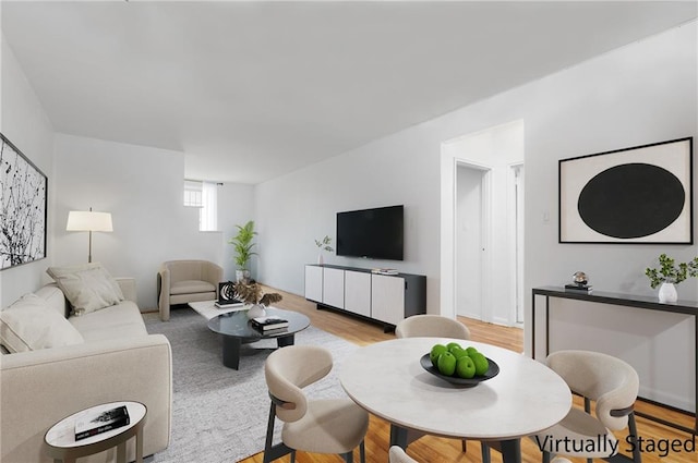living area with light wood-style floors