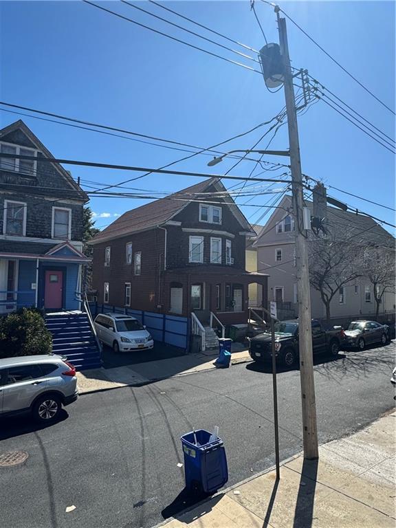 37 Brewster St, Staten Island, NY 10304 - view of asphalt road with sidewalks and street lights