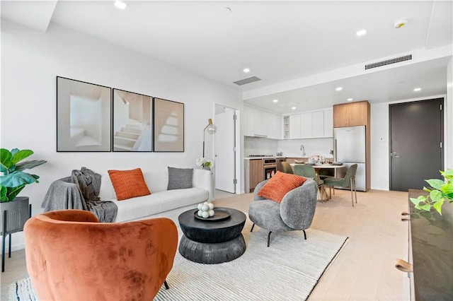 2286 Cropsey Ave Unit 5F, Brooklyn, NY 11214 - living room with recessed lighting and light wood-style flooring
