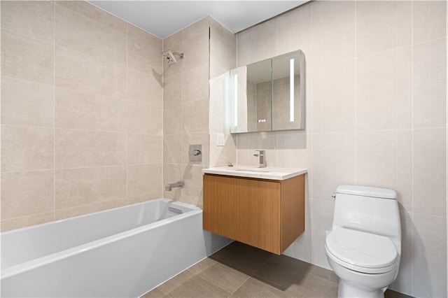 2286 Cropsey Ave Unit 5F, Brooklyn, NY 11214 - full bathroom featuring vanity, toilet, tile walls, tile patterned floors, and  shower combination