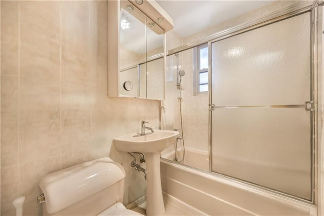 9040 Fort Hamilton Pkwy Unit 3K, Brooklyn, NY 11209 - bathroom with shower / bath combination with glass door and tile walls