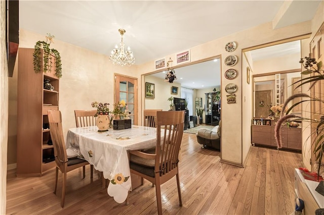 9040 Fort Hamilton Pkwy Unit 3K, Brooklyn, NY 11209 - dining area with a chandelier and light wood-type flooring