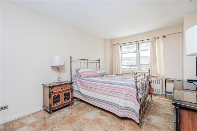2928 W 5th St Unit 5F, Brooklyn, NY 11224 - bedroom featuring radiator heating unit and baseboards