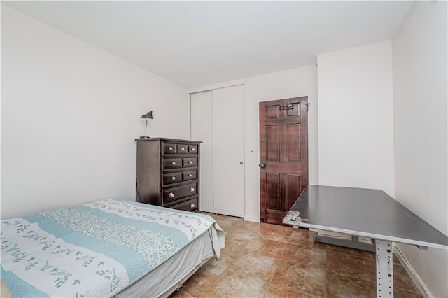 2928 W 5th St Unit 5F, Brooklyn, NY 11224 - bedroom featuring a closet and baseboards