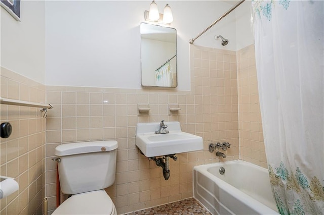 2928 W 5th St Unit 5F, Brooklyn, NY 11224 - bathroom with tile walls, shower / bath combination with curtain, and wainscoting