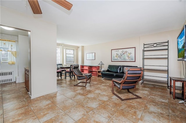 2928 W 5th St Unit 5F, Brooklyn, NY 11224 - living area featuring radiator heating unit and a ceiling fan