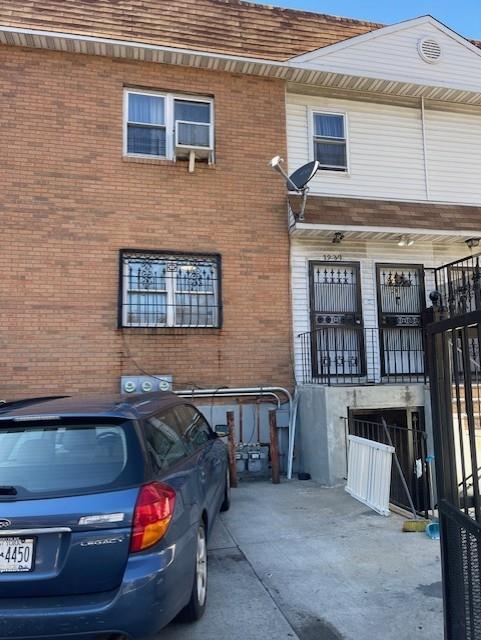 view of front of house featuring brick siding