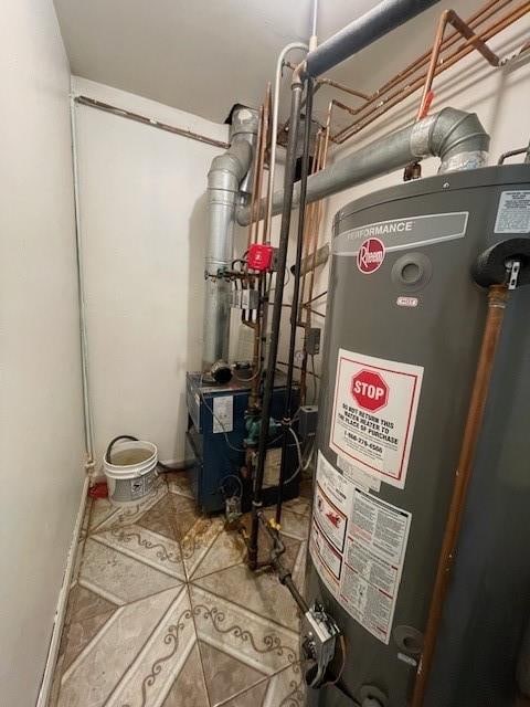 utilities featuring gas water heater and a heating unit