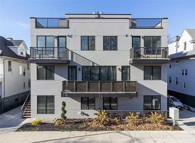 8794 17th Ave Unit 301, Brooklyn, NY 11214 - view of building exterior with stairway