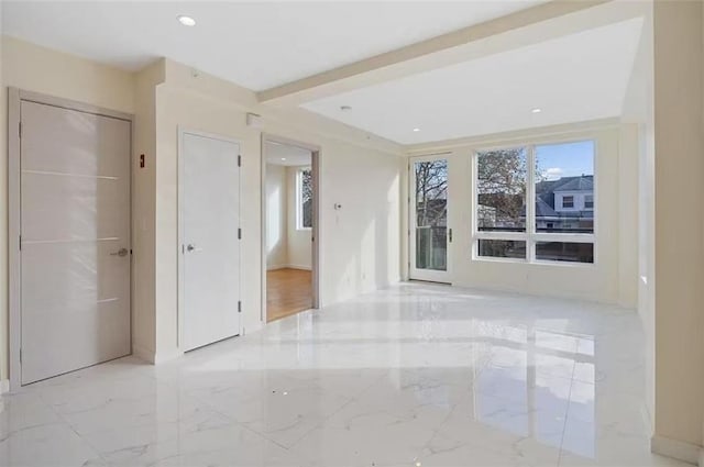 8794 17th Ave Unit 301, Brooklyn, NY 11214 - unfurnished room with marble finish flooring and recessed lighting