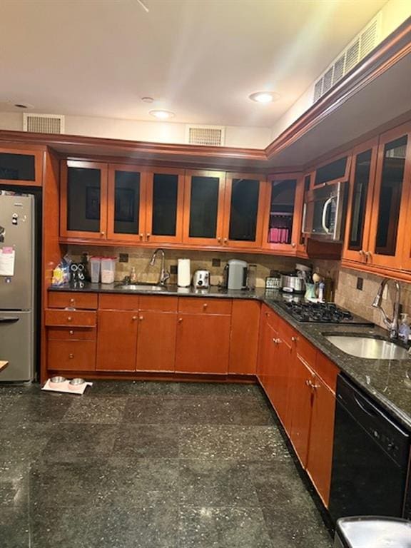 983 E 12th St Unit B, Brooklyn, NY 11230 - kitchen with appliances with stainless steel finishes, a sink, glass insert cabinets, and backsplash