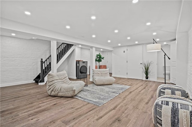 213 E 9th St, Brooklyn, NY 11218 - sitting room with stairway, light wood finished floors, and recessed lighting