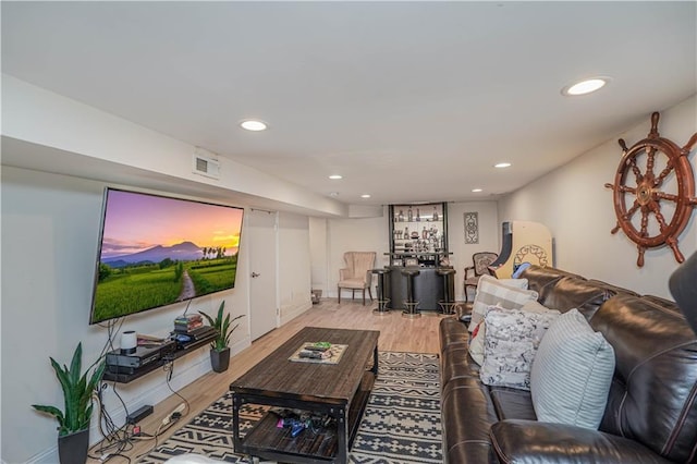 341 Hillman Ave, Staten Island, NY 10314 - living room featuring recessed lighting, wood finished floors, and baseboards