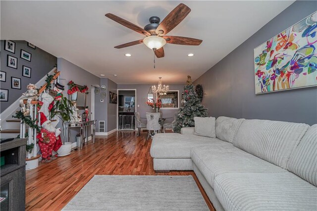 341 Hillman Ave, Staten Island, NY 10314 - living area with ceiling fan, wood finished floors, a chandelier, recessed lighting, and baseboards