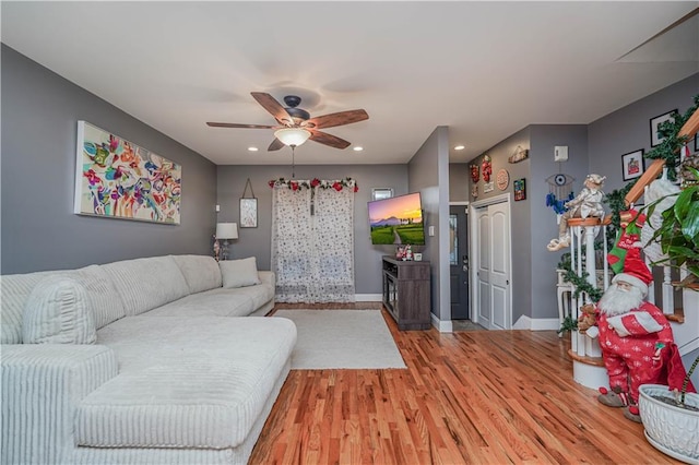 341 Hillman Ave, Staten Island, NY 10314 - living area featuring light wood-style floors, ceiling fan, baseboards, and recessed lighting