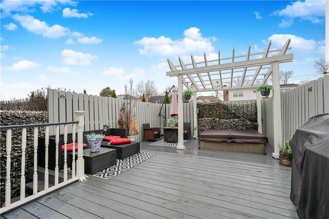 341 Hillman Ave, Staten Island, NY 10314 - wooden deck featuring a covered hot tub, a fenced backyard, a pergola, an outdoor hangout area, and grilling area
