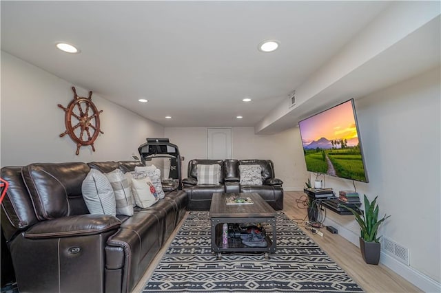 341 Hillman Ave, Staten Island, NY 10314 - living room featuring recessed lighting, wood finished floors, and baseboards
