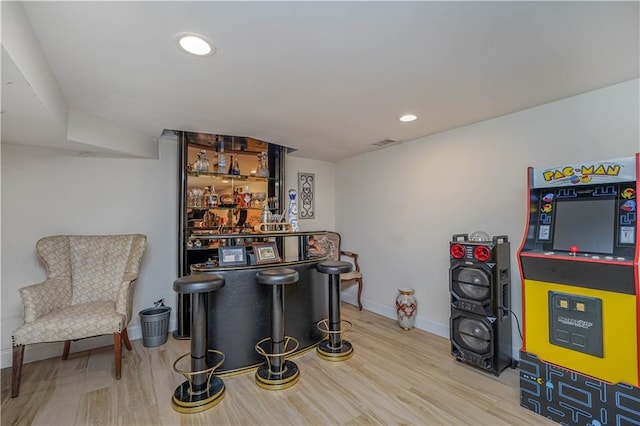 341 Hillman Ave, Staten Island, NY 10314 - indoor dry bar featuring wood finished floors, recessed lighting, and baseboards