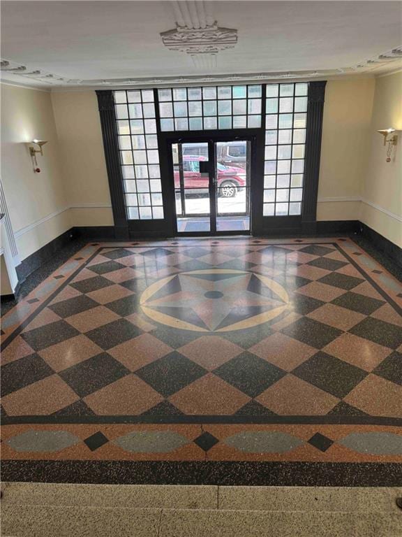 40 Tehama St Unit 6H, Brooklyn, NY 11218 - spare room with baseboards, french doors, and inlaid floor details