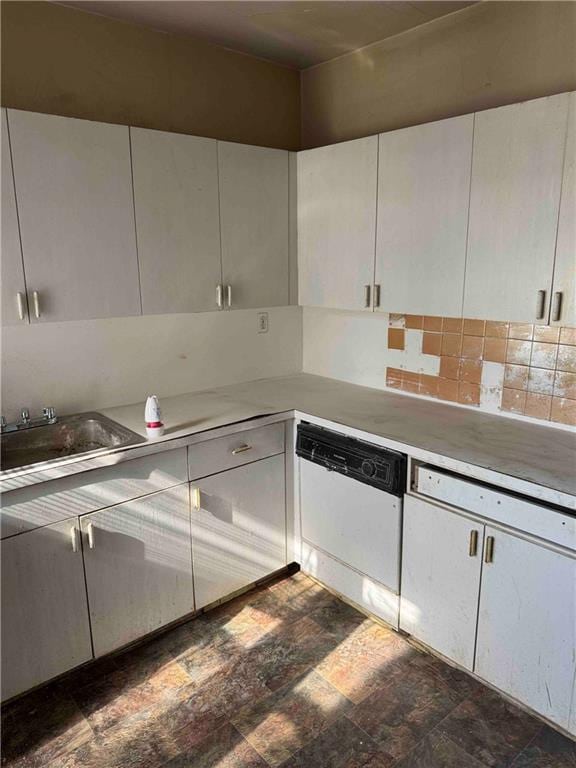 40 Tehama St Unit 6H, Brooklyn, NY 11218 - kitchen with dishwasher, a sink, white cabinetry, and light countertops