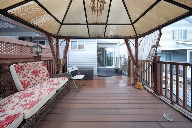 wooden deck featuring a gazebo