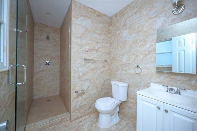 11 Brighton 10th Path, Brooklyn, NY 11235 - bathroom featuring a shower stall, vanity, and tile walls