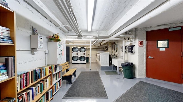 9281 Shore Rd Unit 220, Brooklyn, NY 11209 - unfinished basement featuring separate washer and dryer