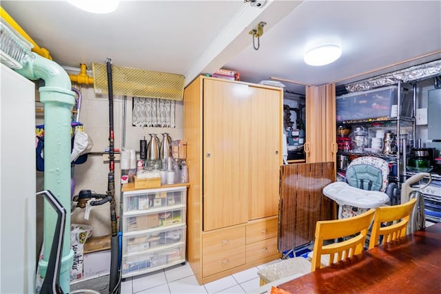 interior space with tile patterned floors