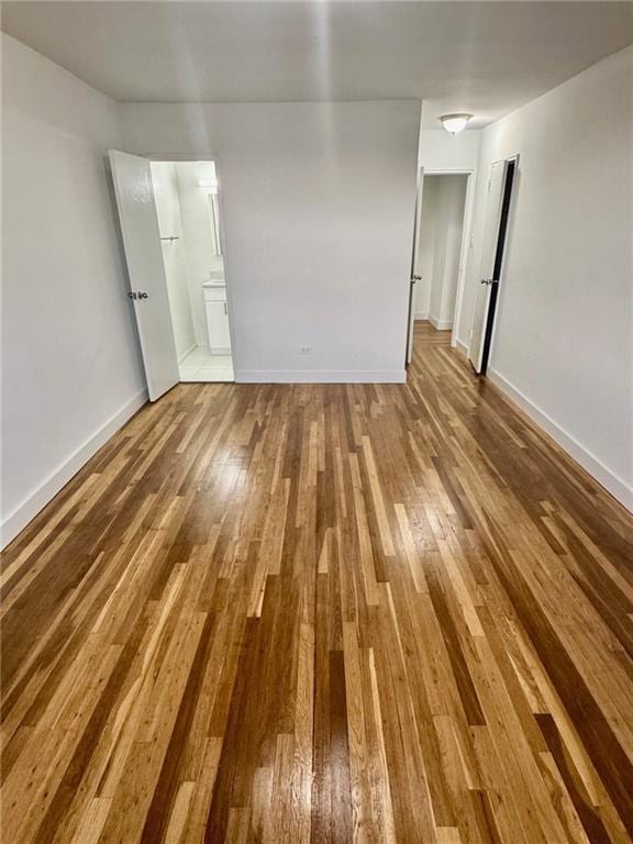 2800 Coyle St Unit 616, Sheepshead Bay, NY 11235 - empty room featuring hardwood / wood-style floors and baseboards
