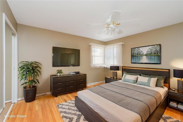 43 Fern Ave, Staten Island, NY 10308 - bedroom with light wood-style floors, baseboards, and ceiling fan