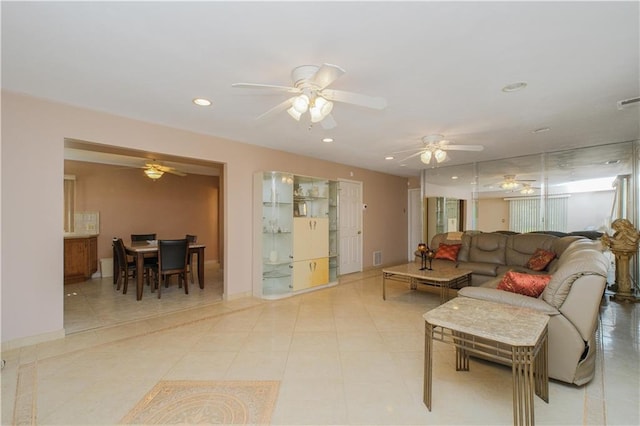43 Fern Ave, Staten Island, NY 10308 - living area with a ceiling fan, recessed lighting, light tile patterned flooring, and baseboards