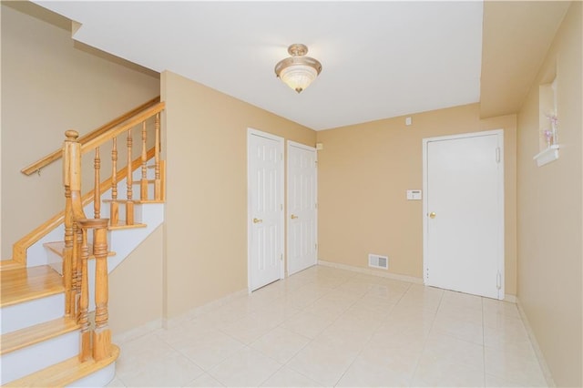 43 Fern Ave, Staten Island, NY 10308 - entryway featuring stairs, baseboards, and tile patterned floors