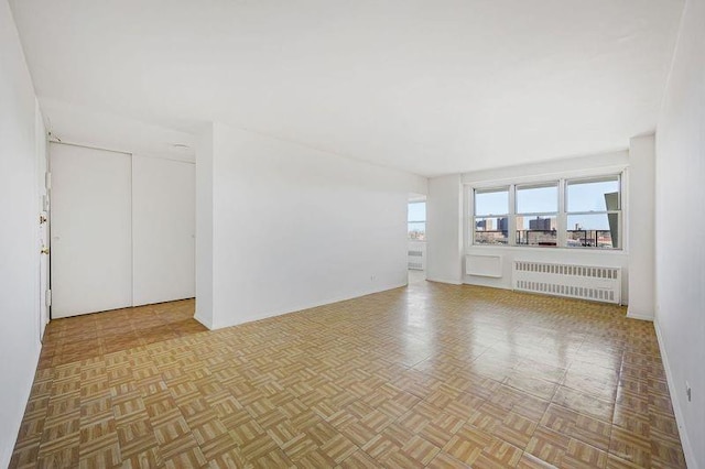 spare room with radiator