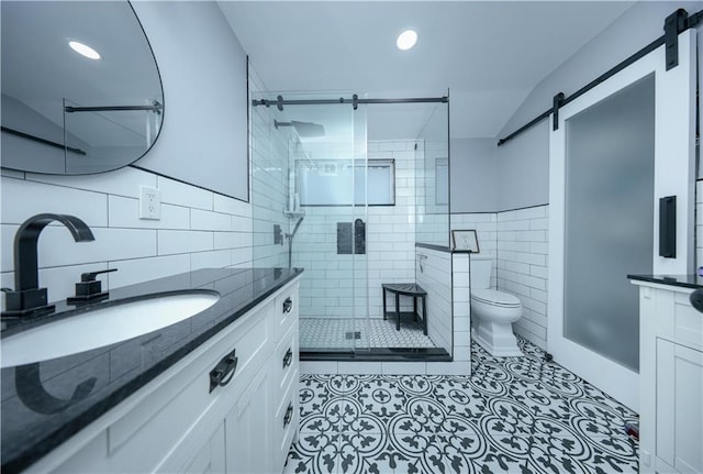 78 Darnell Ln, Staten Island, NY 10309 - full bathroom with tile patterned flooring, vanity, toilet, tile walls, and a stall shower