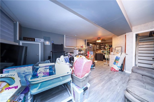 78 Darnell Ln, Staten Island, NY 10309 - living room featuring baseboards, ceiling fan, stairs, and wood finished floors
