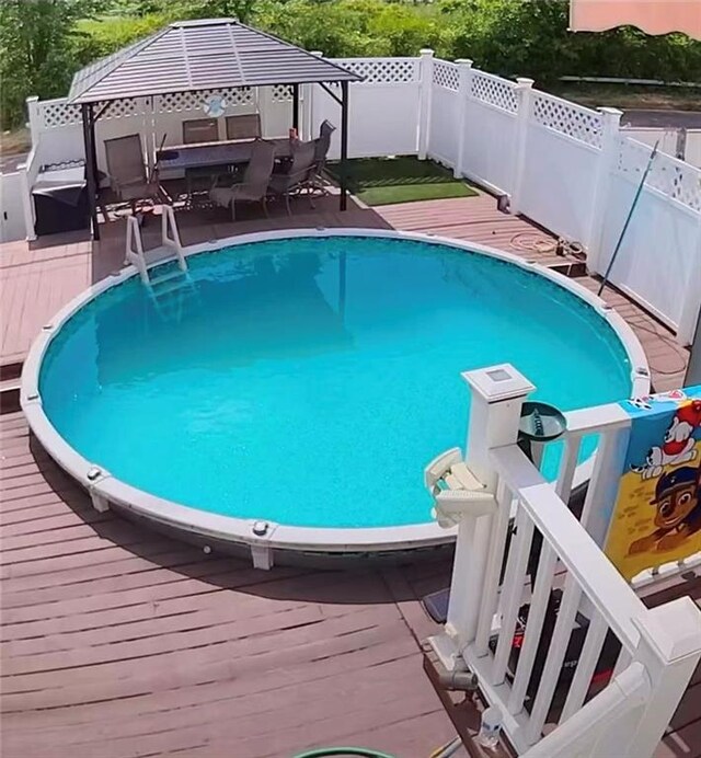 78 Darnell Ln, Staten Island, NY 10309 - view of swimming pool featuring a deck, a fenced in pool, outdoor dining area, and a fenced backyard