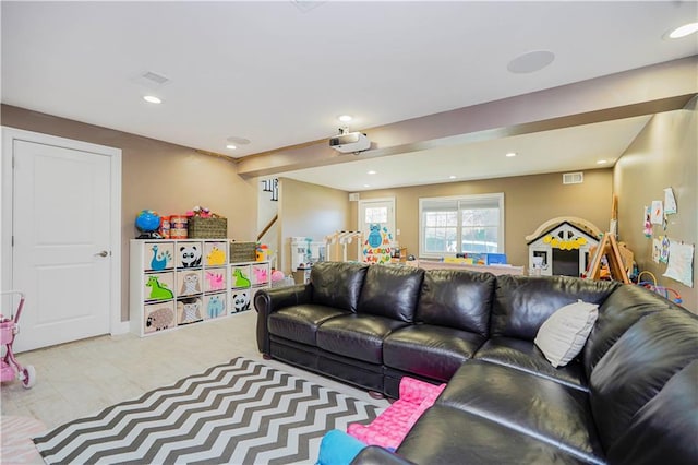 living room featuring recessed lighting, stairs, and visible vents