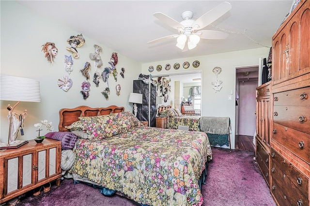 bedroom featuring dark colored carpet and ceiling fan