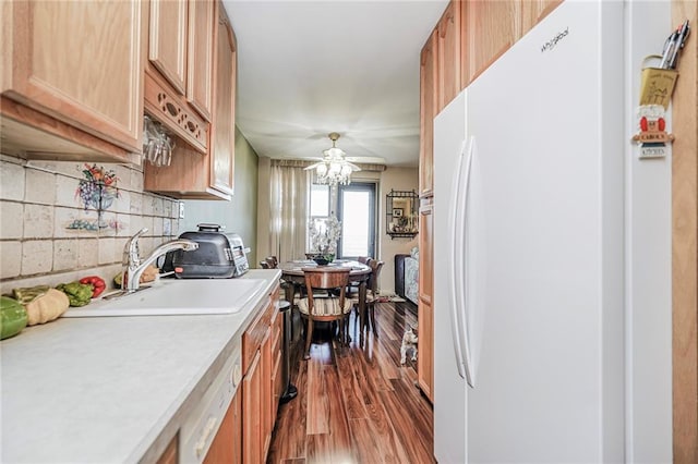 1935 Shore Pkwy Unit 5B, Brooklyn, NY 11214 - kitchen featuring freestanding refrigerator, light countertops, dark wood-type flooring, a sink, and dishwasher