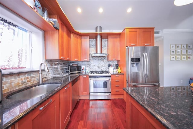 2679 E 24th St Unit 1B, Brooklyn, NY 11235 - kitchen featuring stainless steel appliances, wall chimney range hood, a sink, decorative backsplash, and dark wood-type flooring