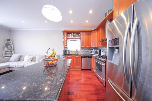 2679 E 24th St Unit 1B, Brooklyn, NY 11235 - kitchen with stainless steel appliances, a sink, ornamental molding, open shelves, and tasteful backsplash